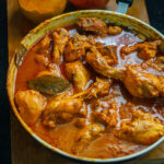 Discover the Best Indian Food in Koh Samui: Top 5 Dishes to Try at Noori India 8 A platter of must-try Indian food in Koh Samui including Butter Chicken, Dal Makhni, Tandoori Chicken, Palak Paneer, and Amritsari Kulcha at Noori India
