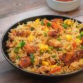indo chinese schezwan chicken fried rice recipe with vegetables and eggs