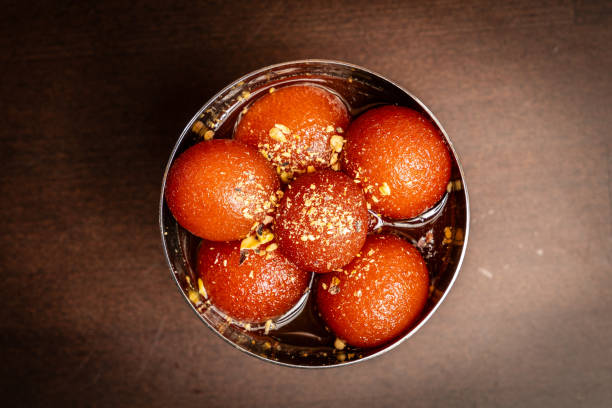 Top 10 Must-Try Indian Dishes in Koh Samui (That Tourists Love) 10 warm gulab jamun in syrup – a classic indian dessert in koh samui
