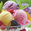 the sun is shining and the scent of freshly fruits fills the air setting the perfect atmosphere for a fruity ice cream social photo