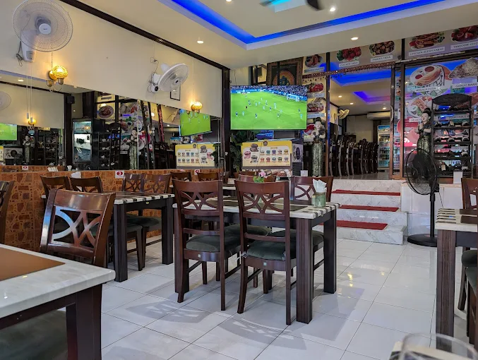 Vegan food in Koh Samui restaurant with tourist dining setup